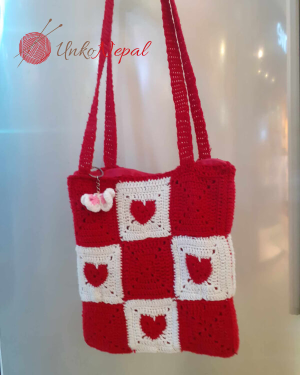 heart decorated hand bag